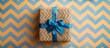 © The 2R Artificiality - Happy Father S Day Greeting Card With Decorated Gift Box And Tied With Blue Bow On Zigzag Striped Background Top View