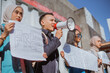 © Odua Images - A diverse group of passionate young activists gathers to demonstrate for freedom with signs