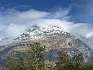 Ice capped mountain with blue sky