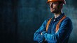 © ADD PHOTO - Confident Construction Worker Wearing Hard Hat and Uniform Standing in Industrial Setting