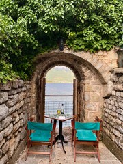 Table for two reserved for a romantic dinner with a view of the Adriatic Sea, Budva, Montenegro