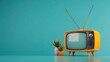 © songwut - Retro-style 1960s TV set with rabbit ear antennas, Vintage electrical appliances, iconic media devices