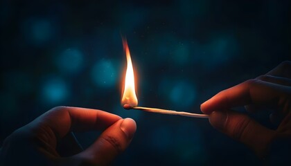 Glowing flame of a matchstick held in hand against a dark bokeh backdrop