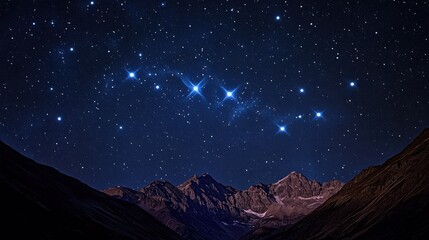 A starry night sky over a mountain range, highlighting the Cassiopeia constellation with its distinctive W shape