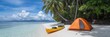 © Joyce - Kayak boat in tropical beach with tent coconut tree