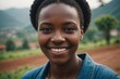 © ThomasLENNE - Close portrait of a smiling young Rwandan woman looking at the camera, Rwandan outdoors blurred background
