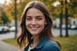 © ThomasLENNE - Close portrait of a smiling young Sammarinese woman looking at the camera, Sammarinese outdoors blurred background