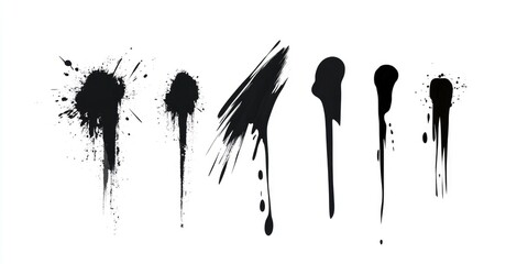 ink blots and splashes in black color on a white background