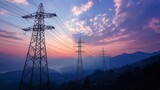 Silhouetted electric power towers against a beautiful sunset sky, symbolizing energy and infrastructure