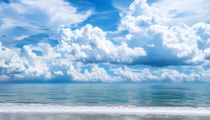 Sticker - Serene scene of fluffy white clouds in a vibrant blue sky above a tranquil turquoise ocean