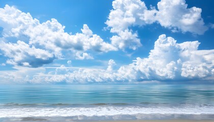 Wall Mural - Serene scene of fluffy white clouds in a vibrant blue sky above a tranquil turquoise ocean