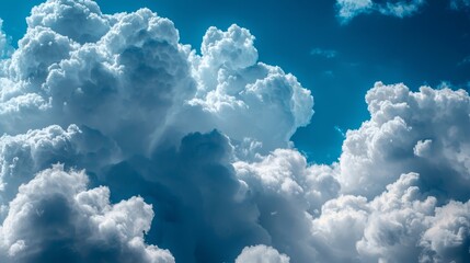 Canvas Print -  A blue sky dotted with white clouds; a plane traverses midway