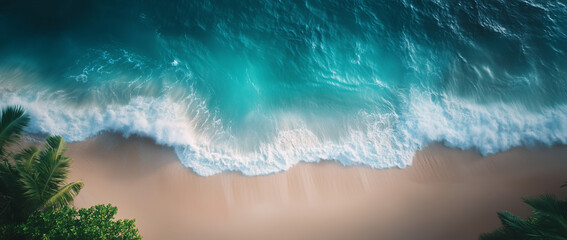 Beautiful aerial drone photograph of the ocean waves and sandy beach in an exotic location. View from above