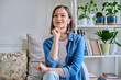 © Valerii Honcharuk - Portrait of young smiling woman in home interior