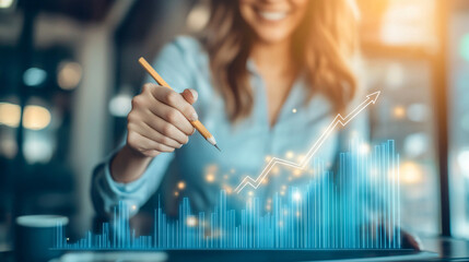 Leinwandbilder - Businesswoman happily analyzing a rising financial chart on a desk with a glowing pen