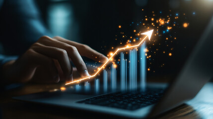 Leinwandbilder - Businessman interactively engaging with a holographic chart on his laptop, with glowing dots in the background
