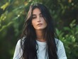 © bvbflo1 - Portrait of young adult woman with long black hair wearing white shirt