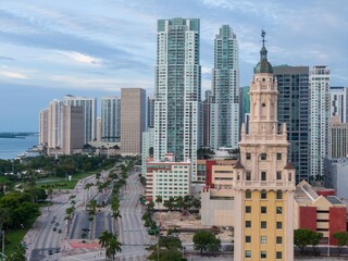 Downtown Miami with morning traffic, skyscrapers and Freedom Tower along the waterfront, Florida, United States.