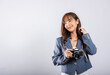 © sorapop - Attractive energetic happy Asian portrait beautiful cute business young woman teen excited smiling holding vintage photo camera, studio shot isolated on white background, traveler female photographer