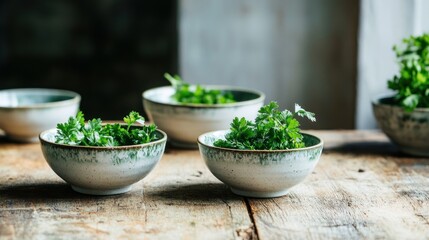 Wall Mural - Fresh herbs in rustic bowls on a wooden surface, emphasizing natural ingredients.