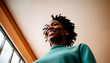 © Mario - Young African American woman with curly hair and bright smile, conveying joy and confidence