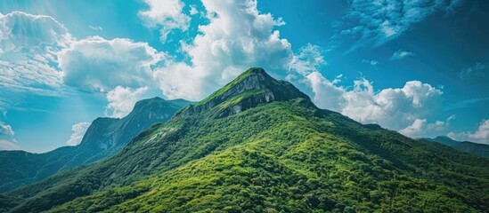 Green Beautiful Mountain And Blue Sky