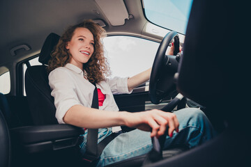 Poster - Photo of adorable lovely girl wear white shirt smiling riding vehicle enjoying trip changing speeds outdoors urban city street