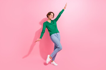 Poster - Full body length photo of funky young lady flying wings arms raised up good mood shopping proposition isolated on pink color background