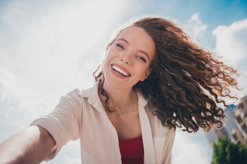 Canvas Print - Photo low angle of pretty sweet woman take selfie photo smile dressed white shirt outdoors urban modern town