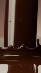 Poster - Super Slow Motion of Splashing Hot Melted Chocolate. Filmed on High Speed Cinema Camera, 1000 fps. Camera in Motion. Extreme Macro Shot.