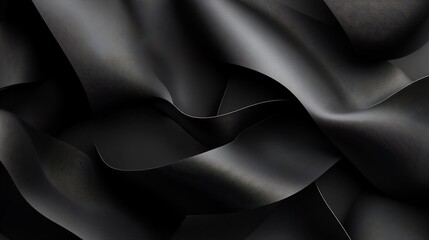 Abstract background of black fabric with soft, flowing lines.