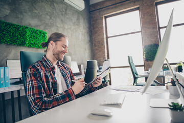 Sticker - Portrait of successful young man worker computer write clipboard wear plaid shirt modern loft business center indoors