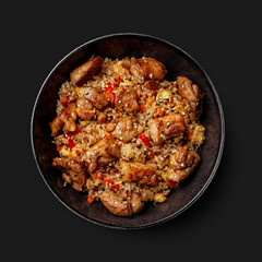 Traditional Asian dish seafood salad, rice, wok, top view, dark background