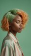 © Nemanja - Young person with yellow and green hair against gradient background