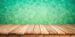 © VisualVault - Empty wooden deck table on mint wallpaper background with copy space for summer gatherings or outdoor dining concept
