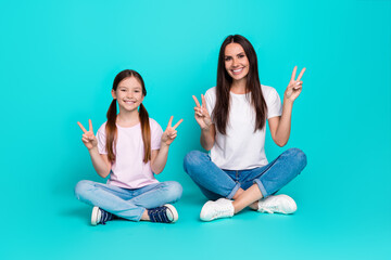 Sticker - Photo of cheerful pretty lovely girl ahave fun with mommy wear white stylish clothes isolated on cyan color background