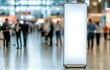 © Monirknn - Blank roll-up banner stand in a busy exhibition hall, generative ai