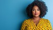 © PaulShlykov - middle agebafrican american woman plus size smiling on blue wall