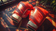 © Hype2Art - Red boxing gloves pair on a sunlight pattern floor, showcasing combat sports equipment.
