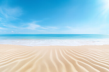 a serene beach with gentle waves and clear blue skies during a calm summer day