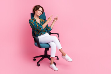 Canvas Print - Full body length photo of young business lady brown hair sitting armchair pointing fingers mockup isolated on pink color background