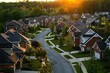 © Vera - Aerial shot of a cluster of houses arranged in a circular pattern in a homeowner's association neighborhood.