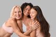 © Pixel-Shot - Beautiful different happy body positive women laughing on grey background