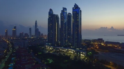 Wall Mural - Stunning Cityscape of Skyscrapers and Illuminated Buildings at Sunset