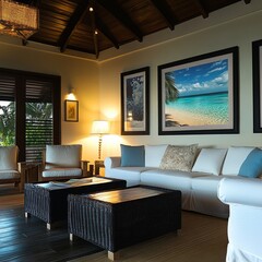 a beautifully furnished living room in a luxury villa in Tropical Jamaica. There is a wall with three framed photos of different sizes: a an a double inside of a single frame in black polystyrene