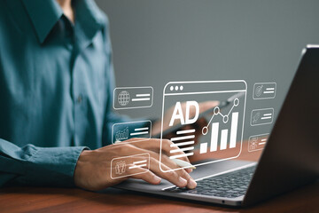 Wall Mural - advertising concept, pr public relations, businessman using laptop with advertising icon on website,