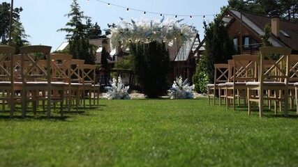 Poster - an arch for a wedding ceremony in a flower garden