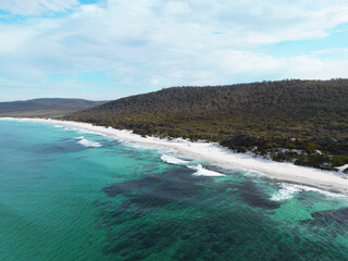 Aerial views over white sandy beach in Tasmania, Australia