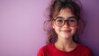 © Thanayut - Cheerful Young Girl in Glasses Smiling Against Light Purple Background - Close-Up Portrait