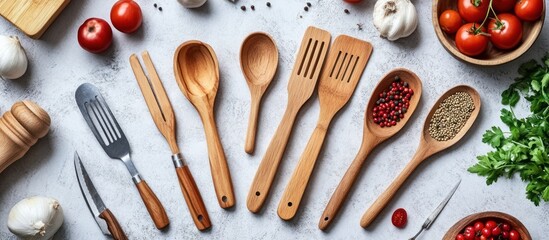 Poster - Wooden kitchen utensils and spices on a kitchen counter.